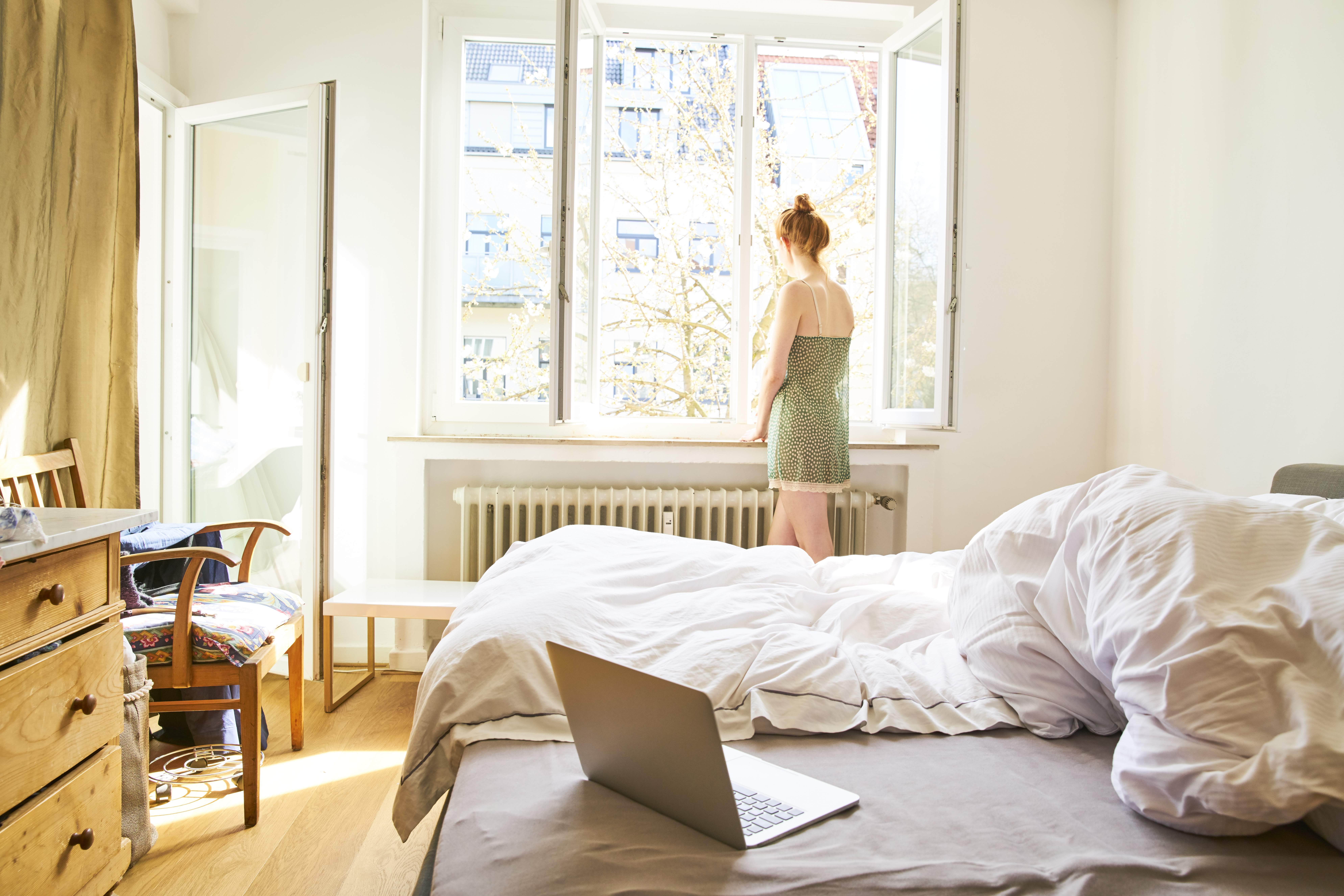 /media/1degxe4u/back-view-of-woman-in-bedroom-looking-out-of-windo-2026-03-09-04-53-44-utc.jpg