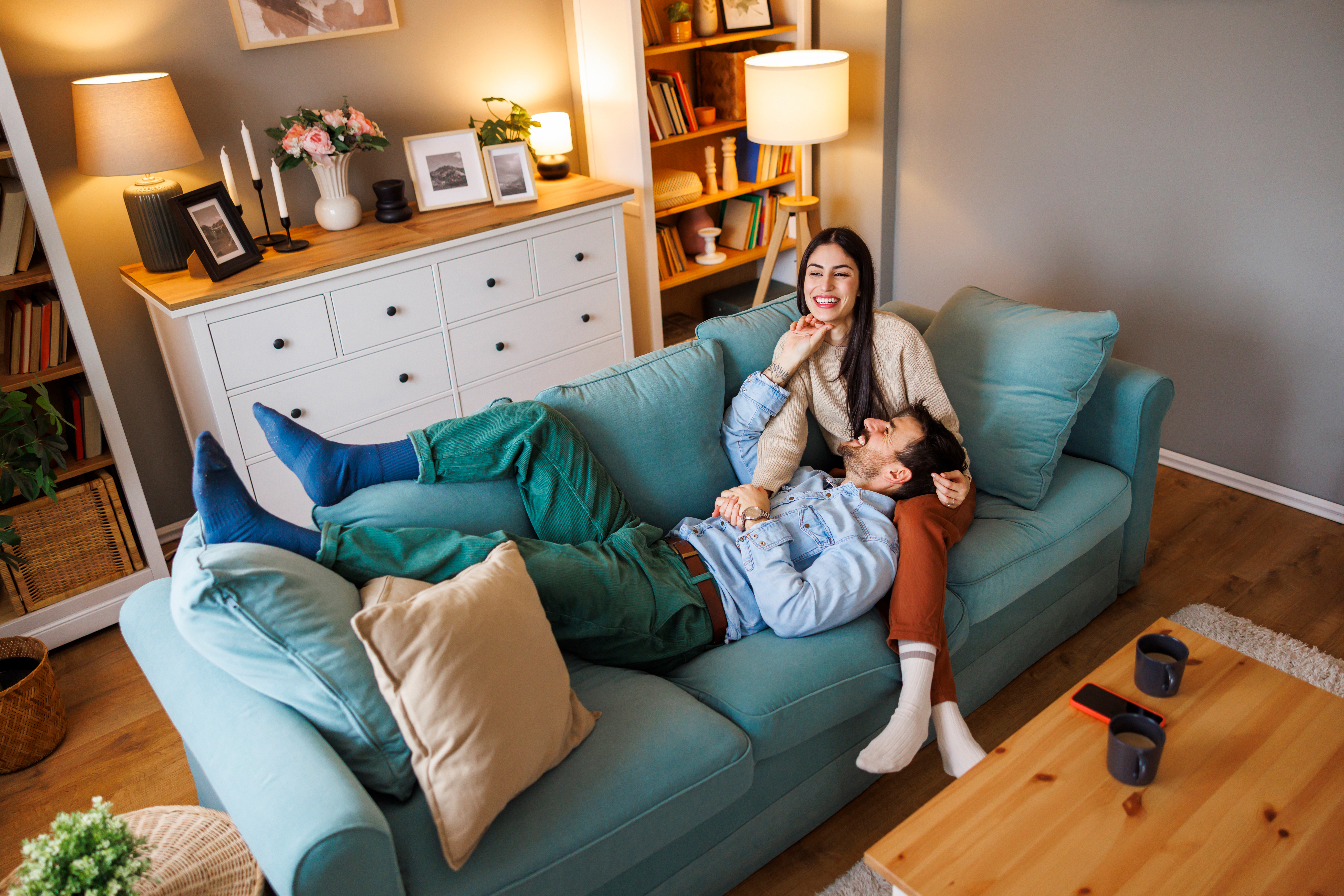 /media/4mzfqfvw/affectionate-couple-relaxing-on-couch-indoors-2026-09-22-12-31-35-utc.jpg