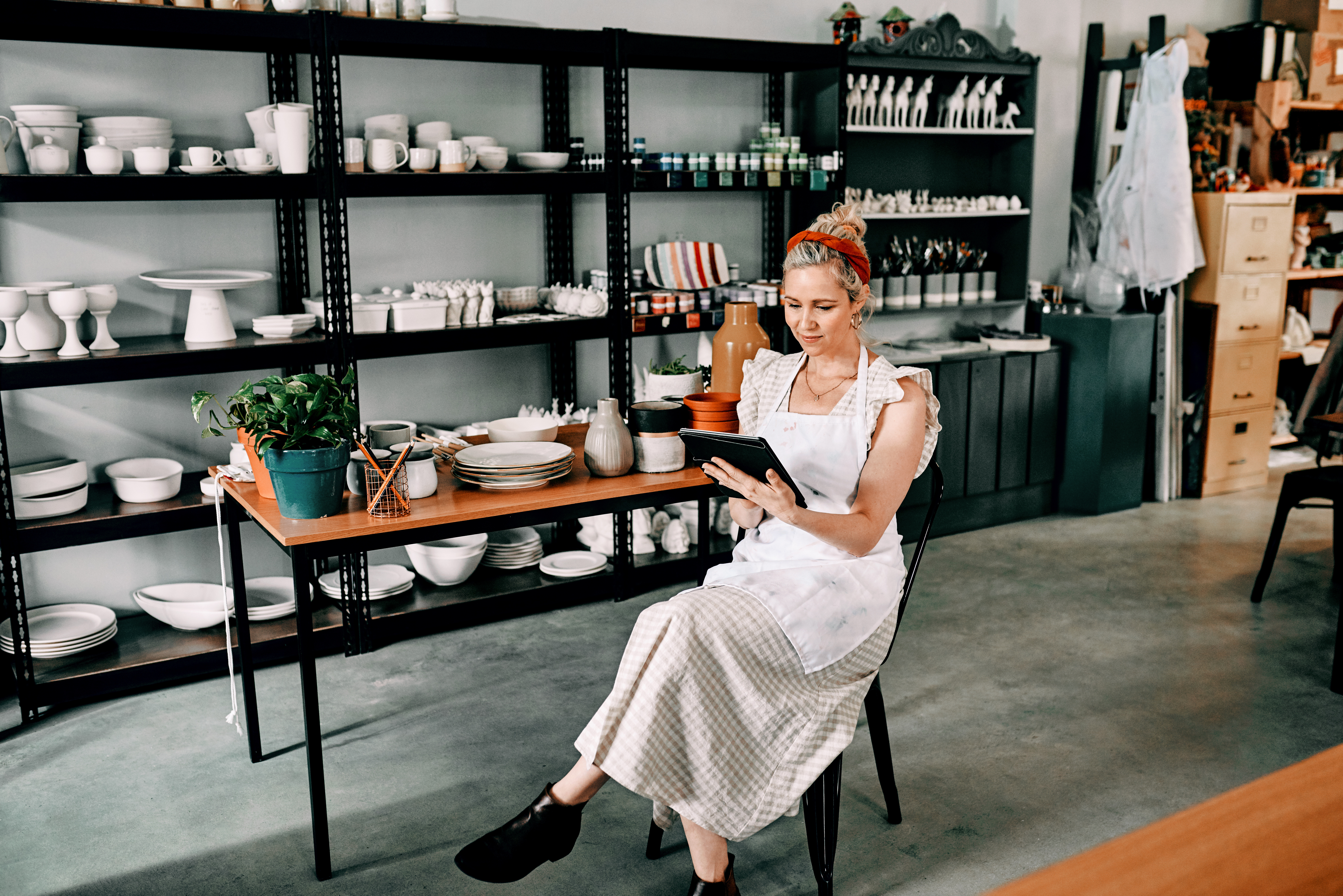 /media/cfsfr2cz/woman-in-ceramics-studio-using-tablet-for-business-2026-09-24-15-06-15-utc.jpg