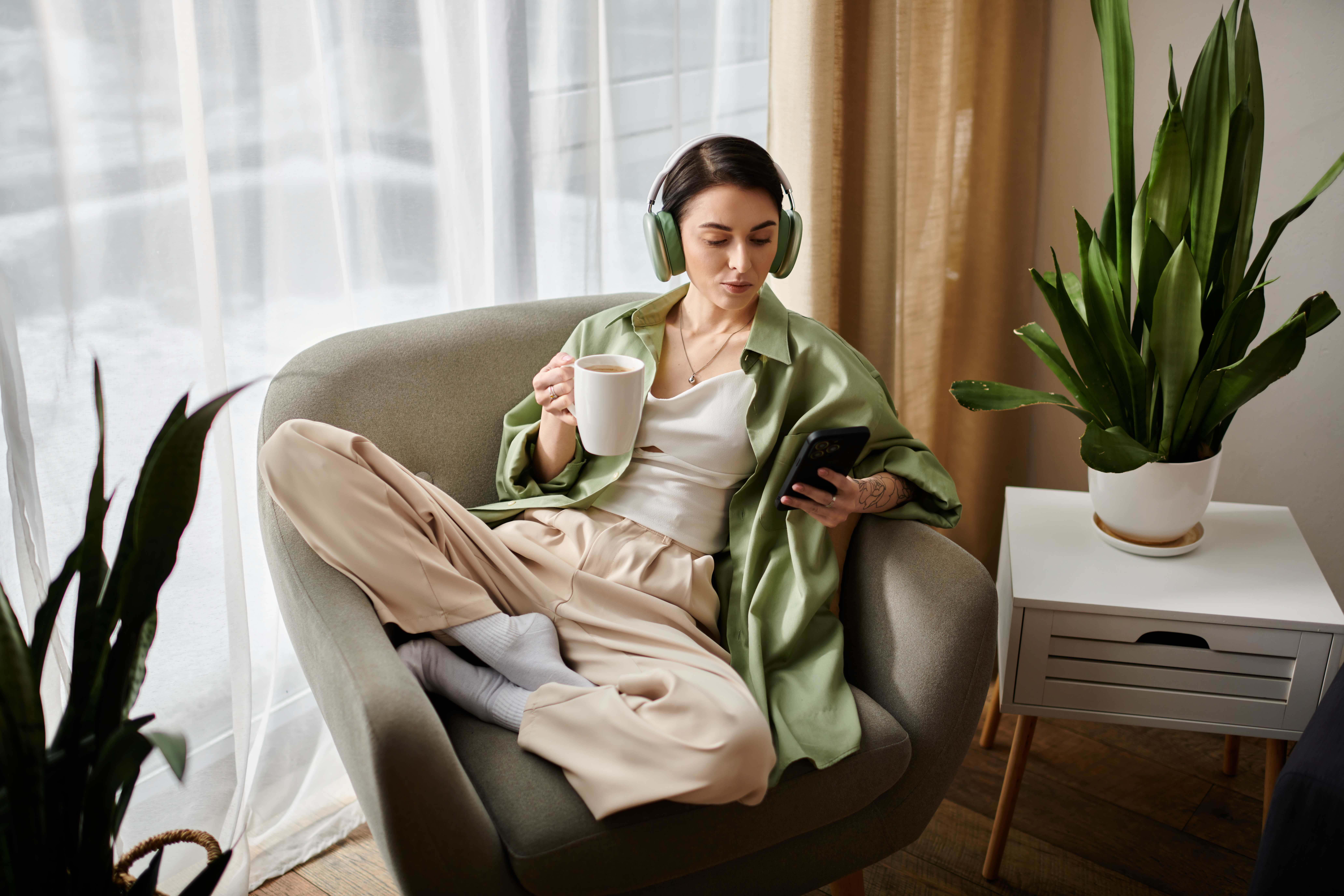 /media/f4vi5n0j/relaxed-woman-enjoying-coffee-and-music-at-home-2026-01-06-00-20-34-utc.jpg